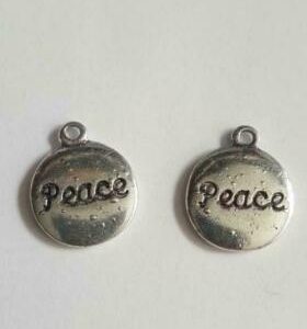 Munt rond tekst “Peace” 13 x 16 mm