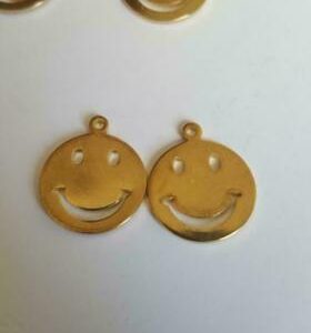 Bedel smile 9 x 11 mm. Goudkleurig.